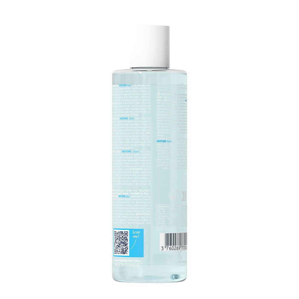 Dos d'un flacon transparent de solution pour la peau. Texte et code-barres visibles. Bouchon blanc.