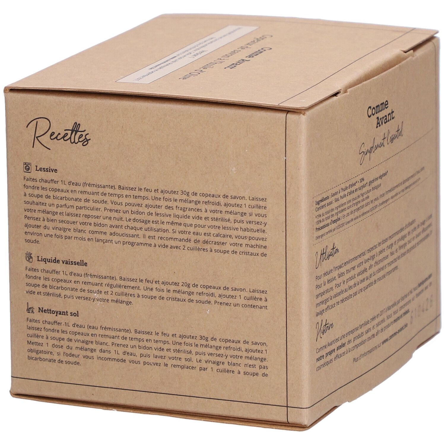 Boîte en carton avec nom et logo du produit. Inscription : Comme Avant Copeaux de Savon à l'Huile d'Olive. Texte avec recettes et conseils d'utilisation.
