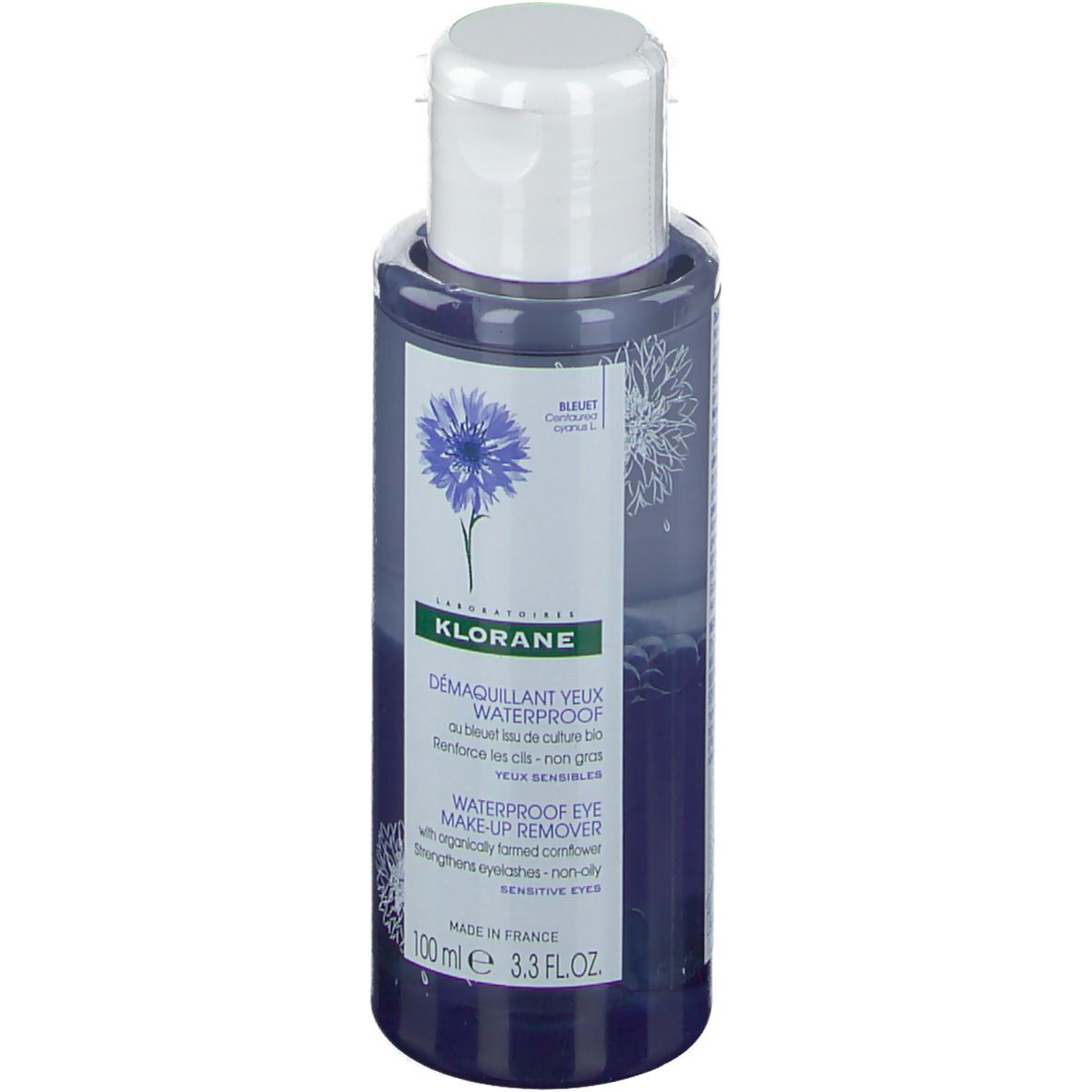 Démaquillant yeux waterproof Klorane. Flacon bleu avec bouchon blanc. Motif bleuet.