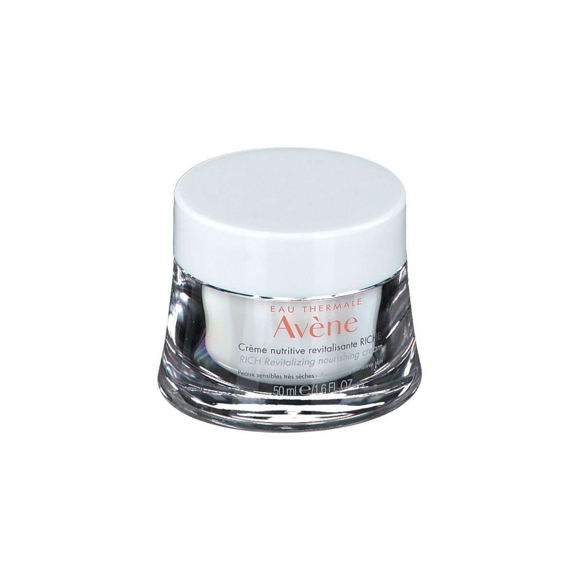 Pot de crème avec couvercle blanc. L'étiquette indique "Eau Thermale Avène".
