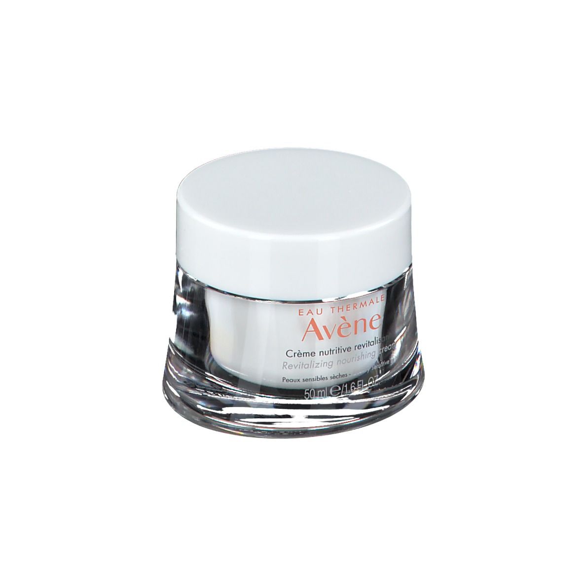 Pot de crème avec couvercle blanc. Inscription: Eau Thermale Avène, Crème nutritive revitalisante. Pour peaux sèches et sensibles.