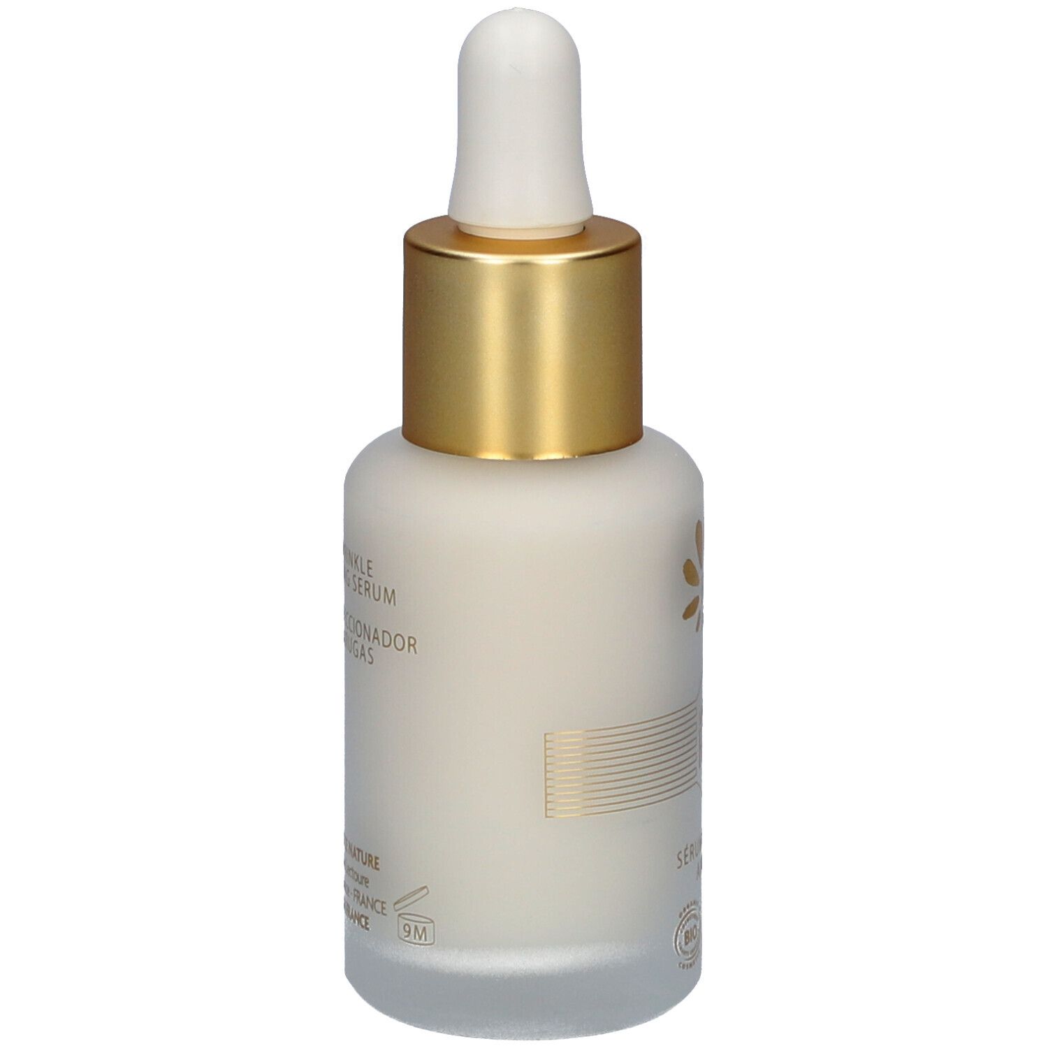 Dos du flacon avec bouchon doré. Inscription: Elixir Royal, sérum perfecteur anti-rides. 30 ml.