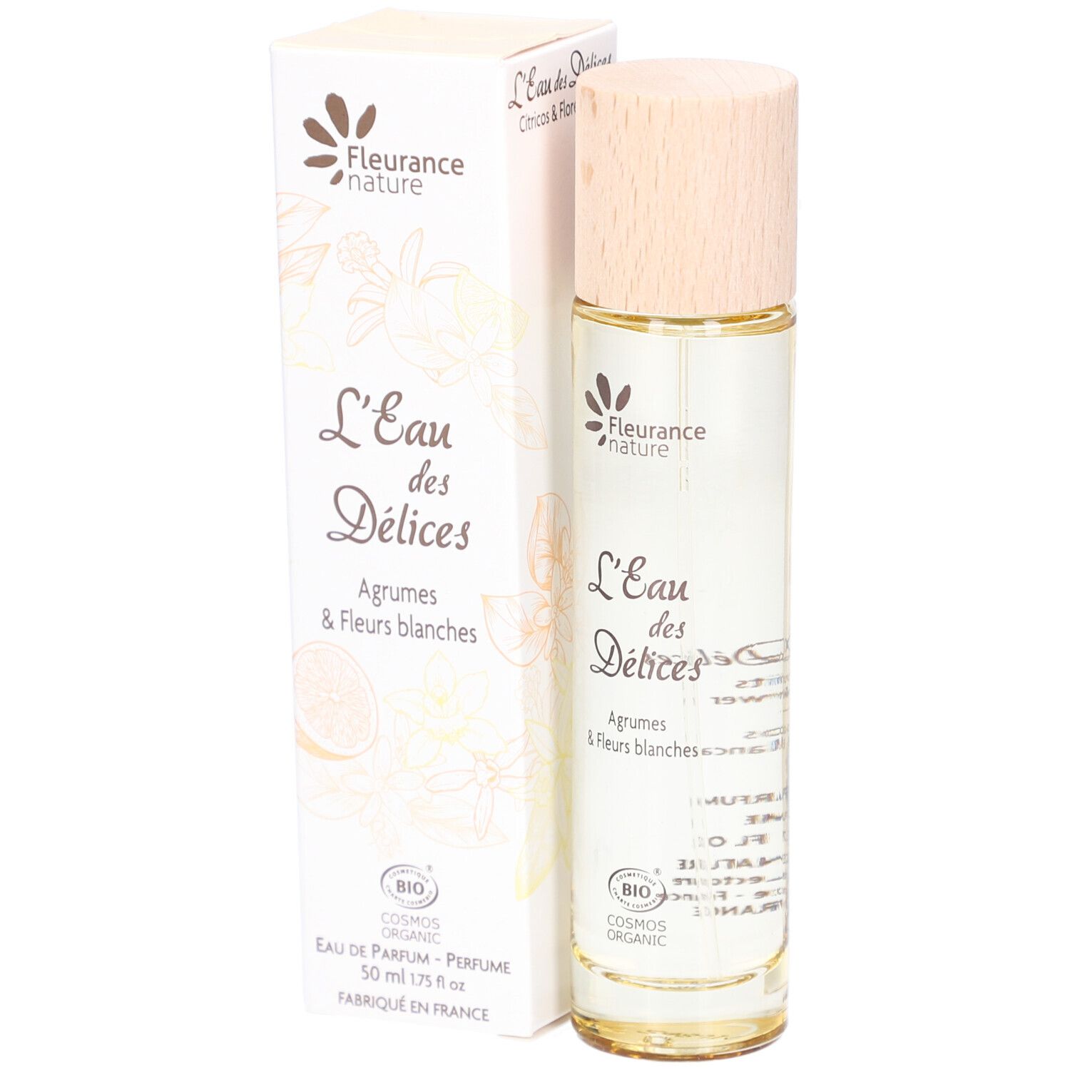 Flacon de parfum et boîte. Inscription : L'Eau des Délices, Agrumes & Fleurs blanches. Certification bio.