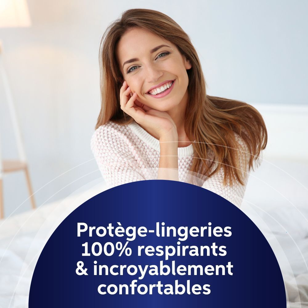 Femme souriante, Vania Confort: protège-slips 100% respirants et confortables.