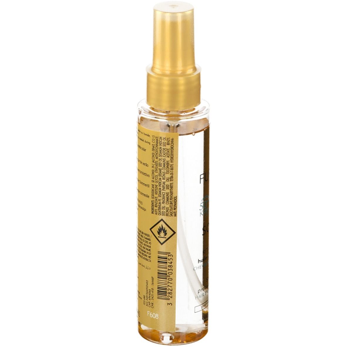 Flacon spray transparent avec bouchon doré. Dos avec texte et code-barres. Huile solaire.