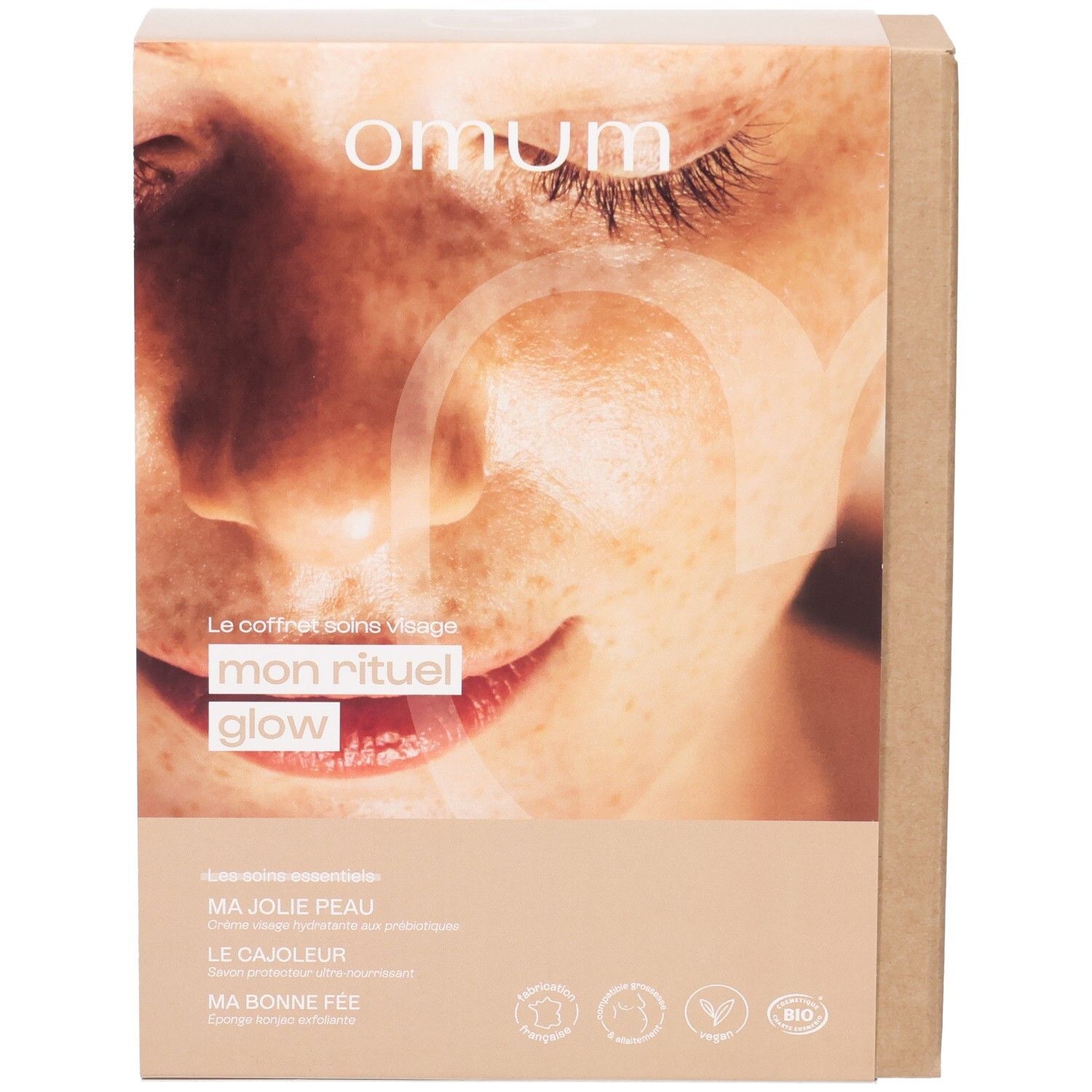 Face avant de la boîte cadeau OMUM 'Mon Rituel Glow' avec image de visage.