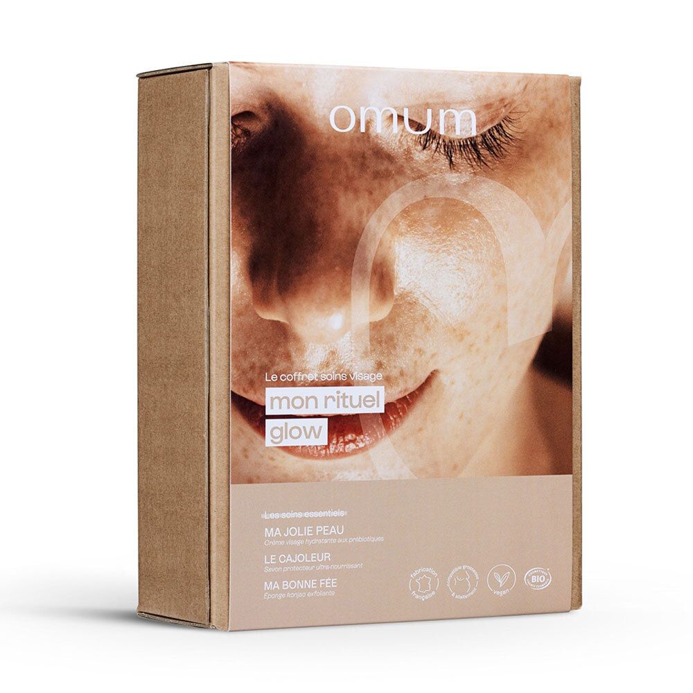 Boîte cadeau OMUM 'Mon Rituel Glow' avec une image de visage.