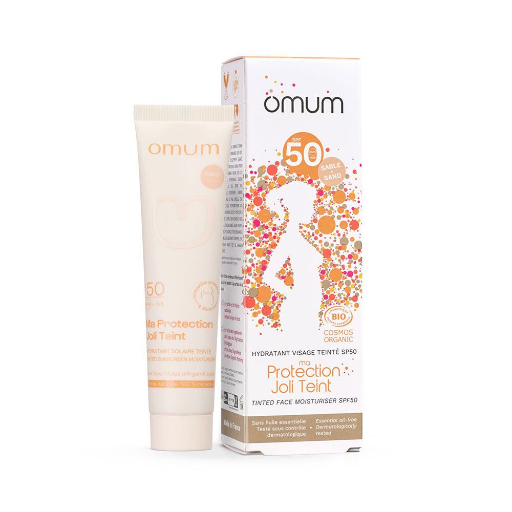 Crème solaire teintée OMUM SPF 50, tube et boîte.
