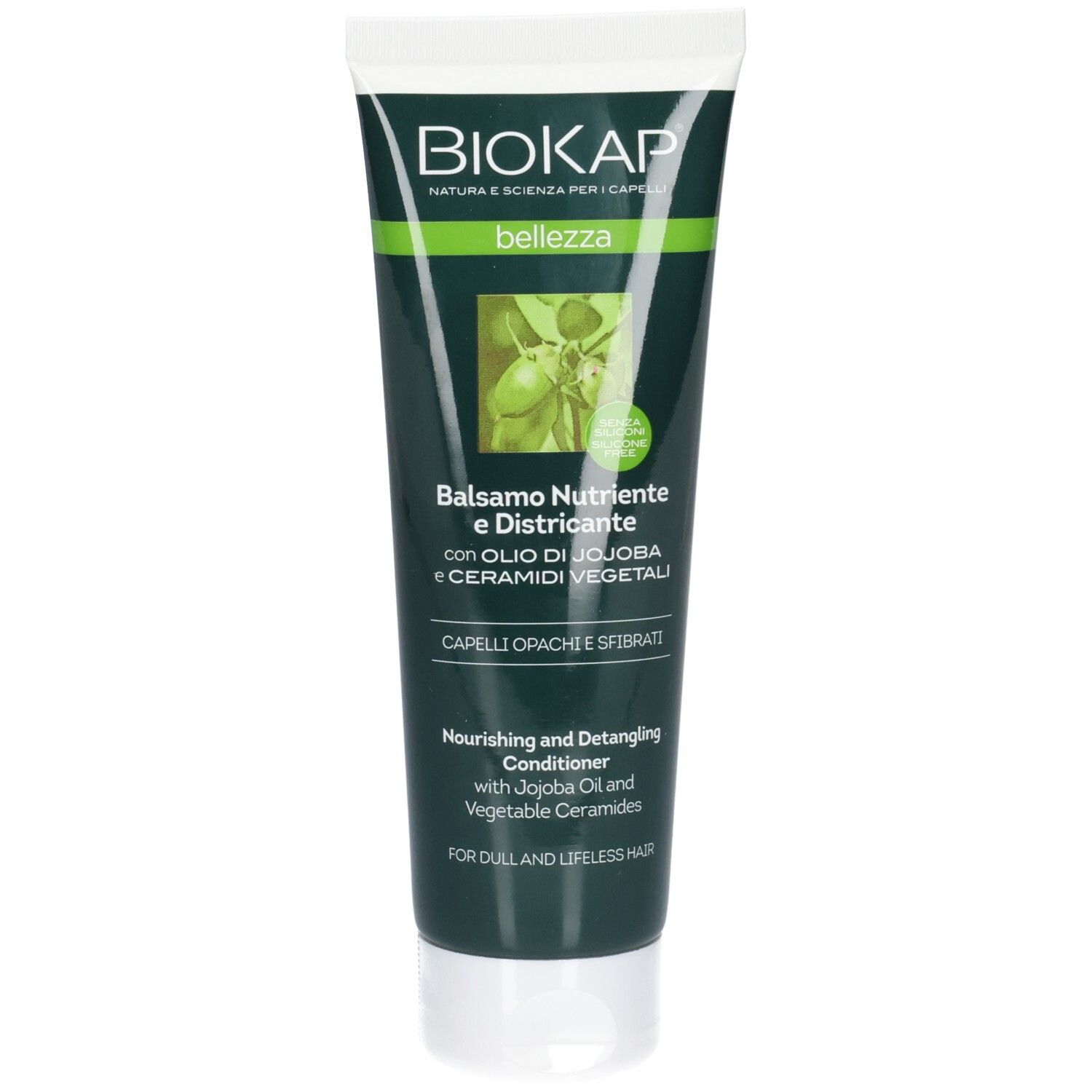 Tube vert avec bouchon blanc. Inscription BIOKAP, bellezza, Balsamo Nutriente e Districante. Contient de l'huile de jojoba et des céramides.