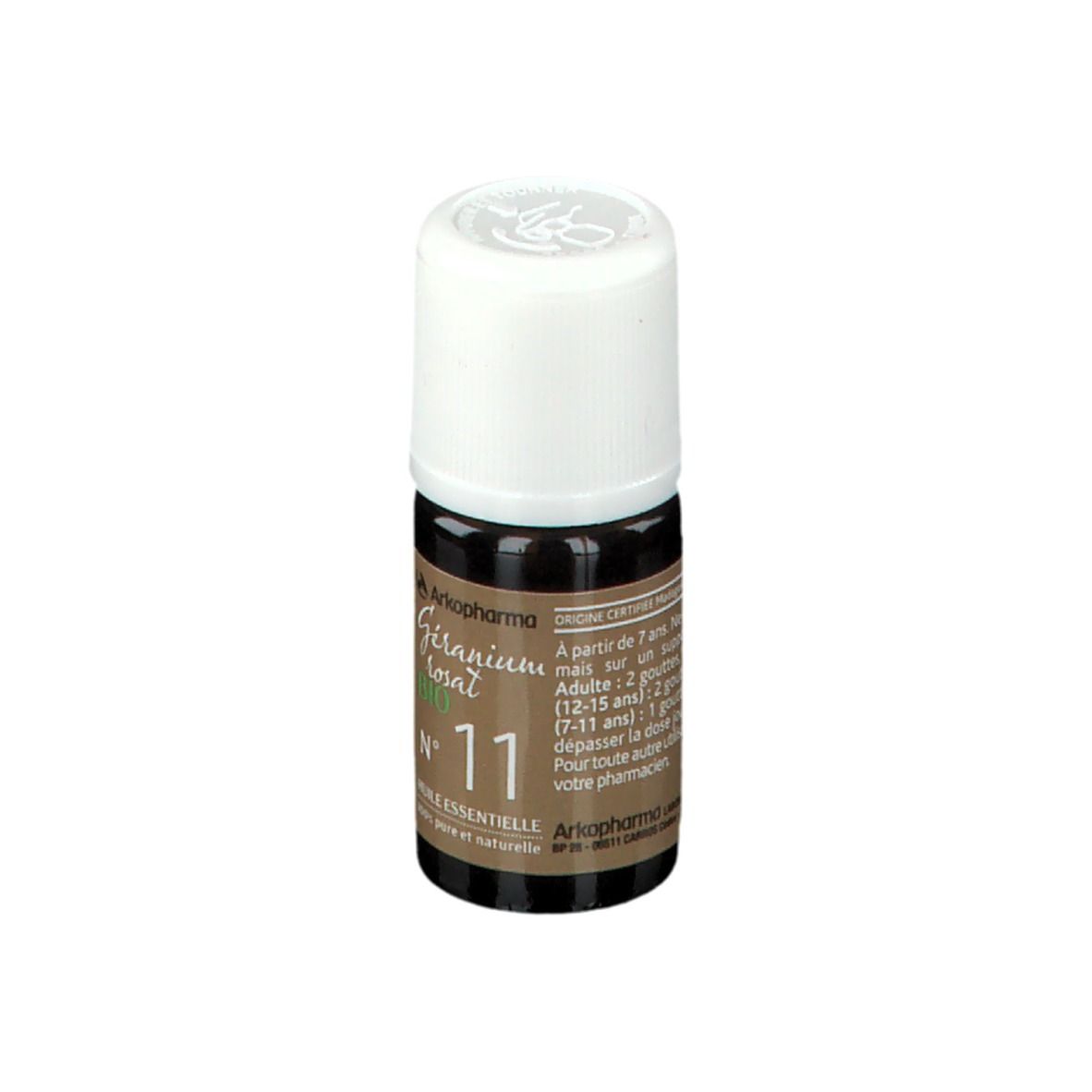 Flacon en verre brun, bouchon blanc. Étiquette avec informations produit et certifications.