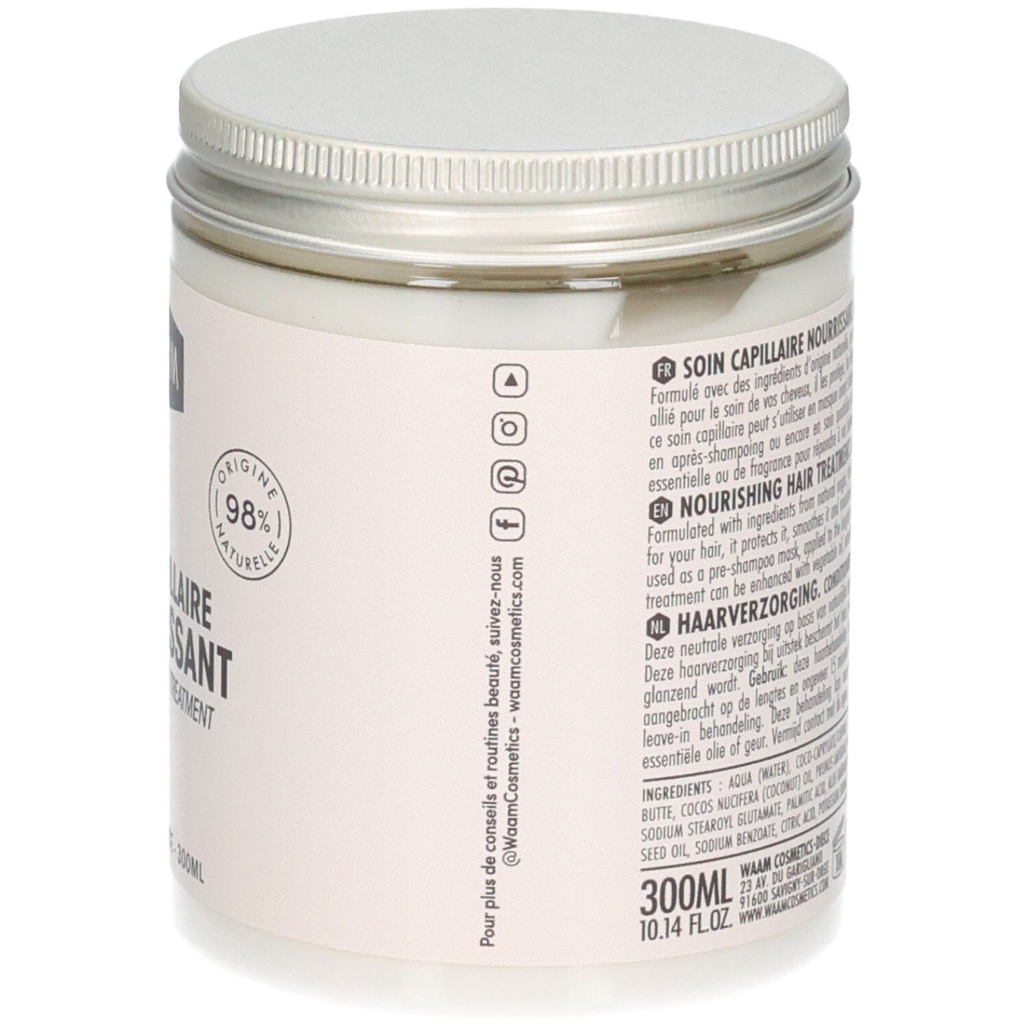 Vue latérale d'un pot blanc de Waam Soin Capillaire Nourrissant. Étiquette avec ingrédients et instructions.