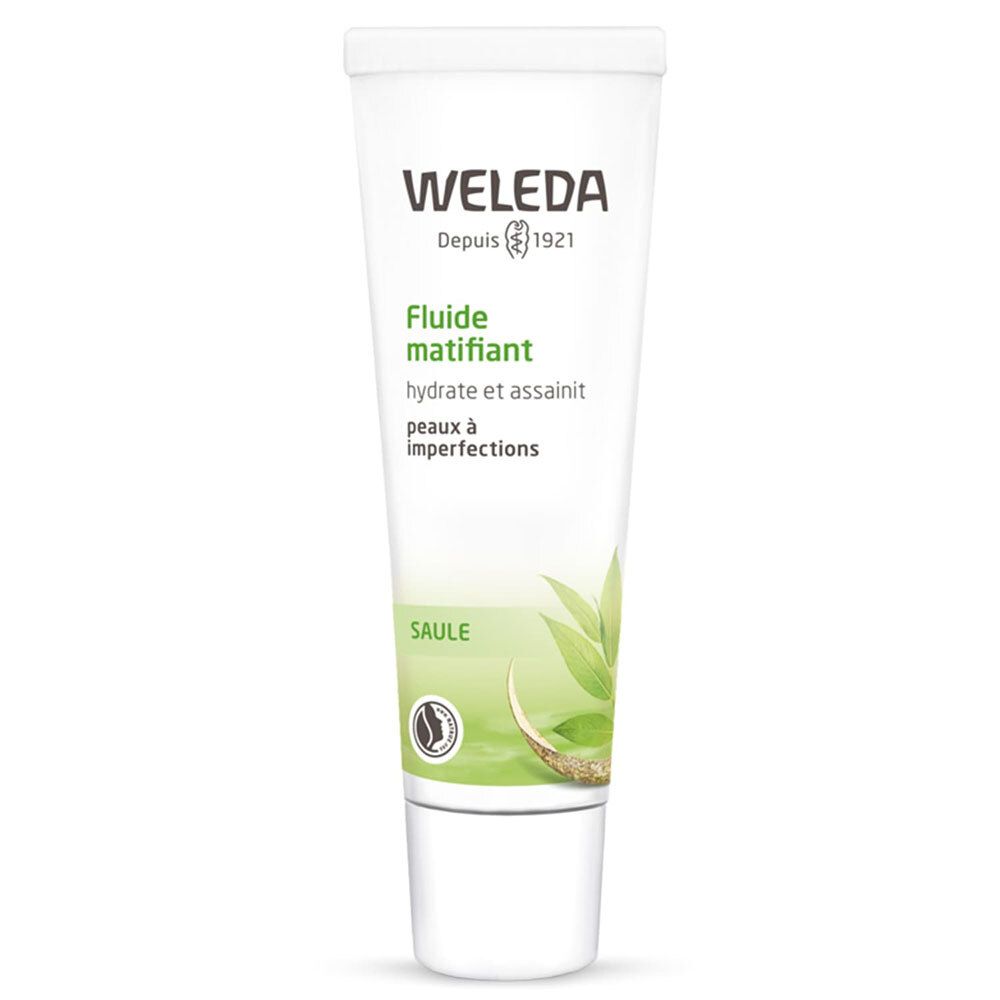 Tube blanc avec impression verte. Contient un fluide matifiant. Marque : WELEDA. Avec logo et illustration végétale.
