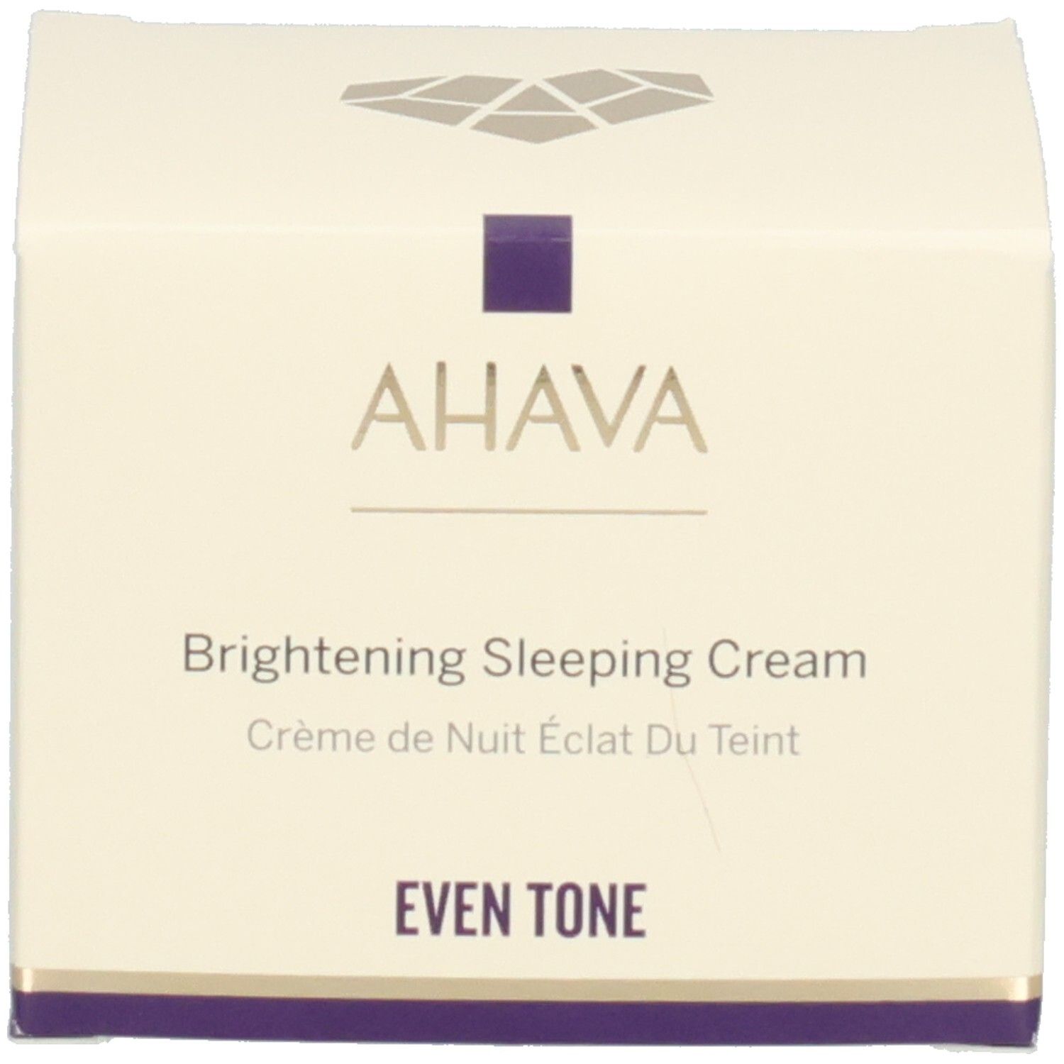Boîte avec inscription AHAVA, Brightening Sleeping Cream. Blanc avec accents violets.