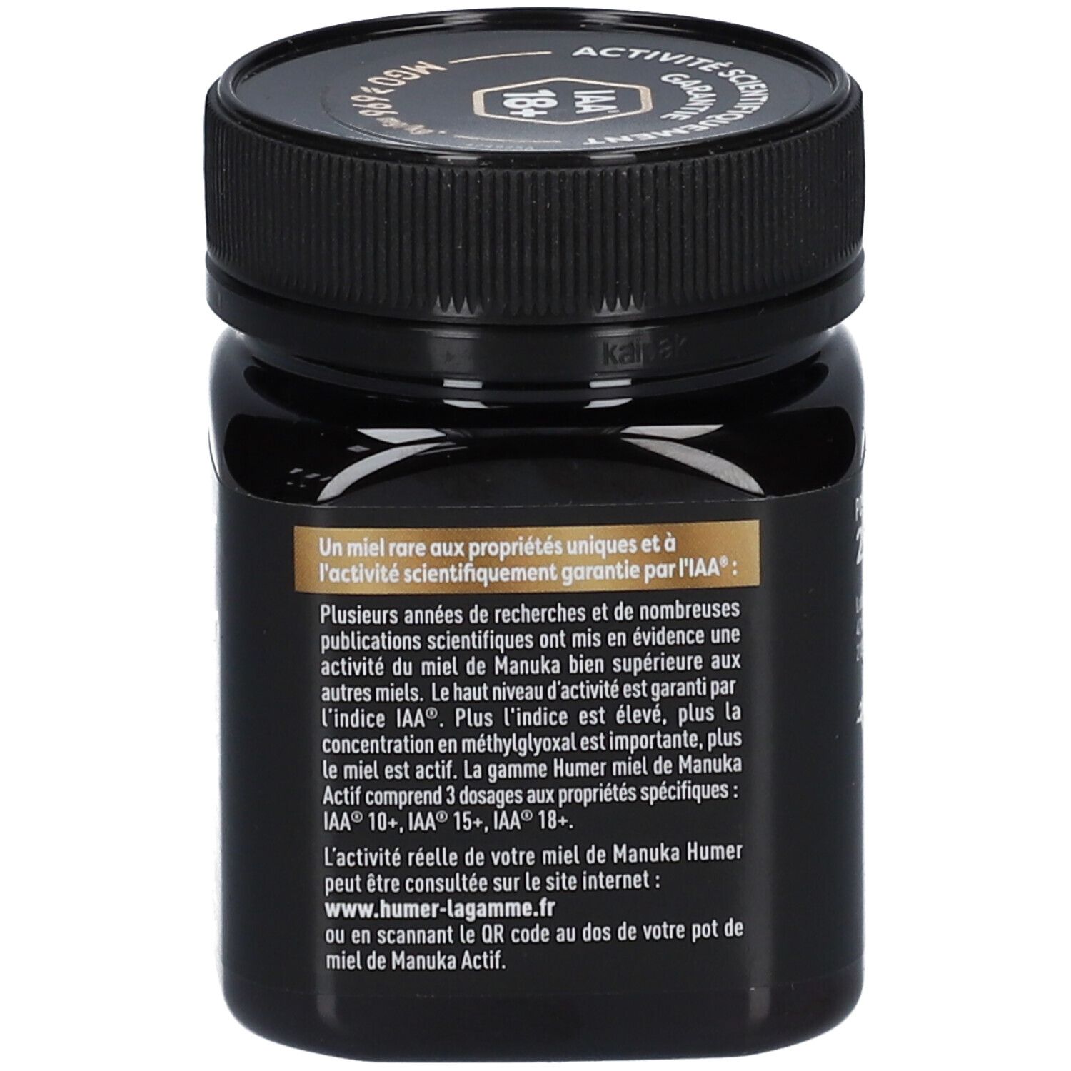 Dos du pot noir de miel de Manuka HUMER. Texte sur les propriétés du miel.