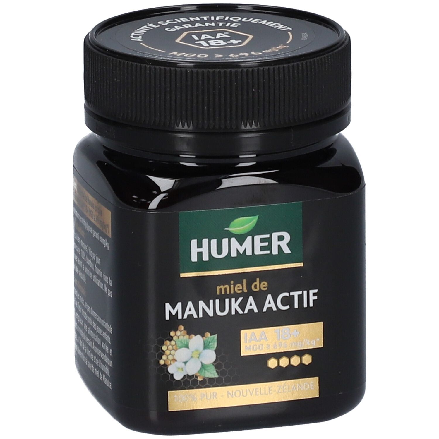 Pot noir de miel de Manuka HUMER. IAA 18+ et MGO ≥ 696 mg/kg. Étiquette avec motif floral.