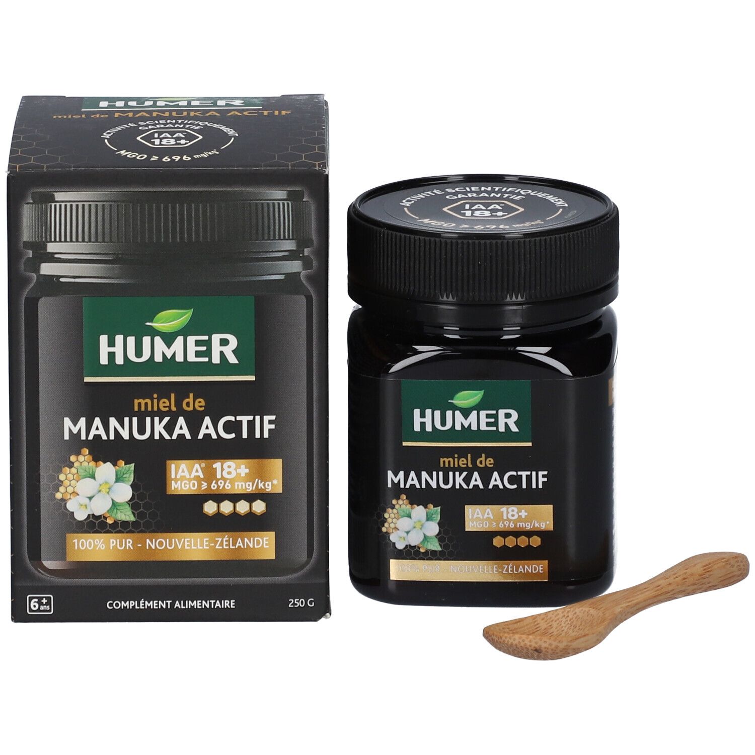 Miel de Manuka HUMER, pot noir et emballage. IAA 18+ et MGO ≥ 696 mg/kg. Cuillère en bois.