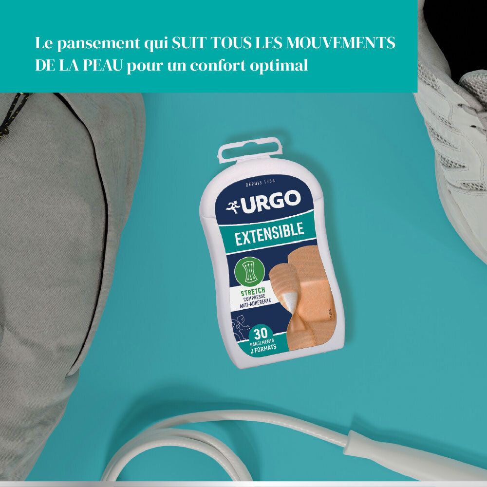 Boîte de pansements URGO Extensible à côté d'équipement sportif. Texte: 'Le pansement qui suit tous les mouvements de la peau'.