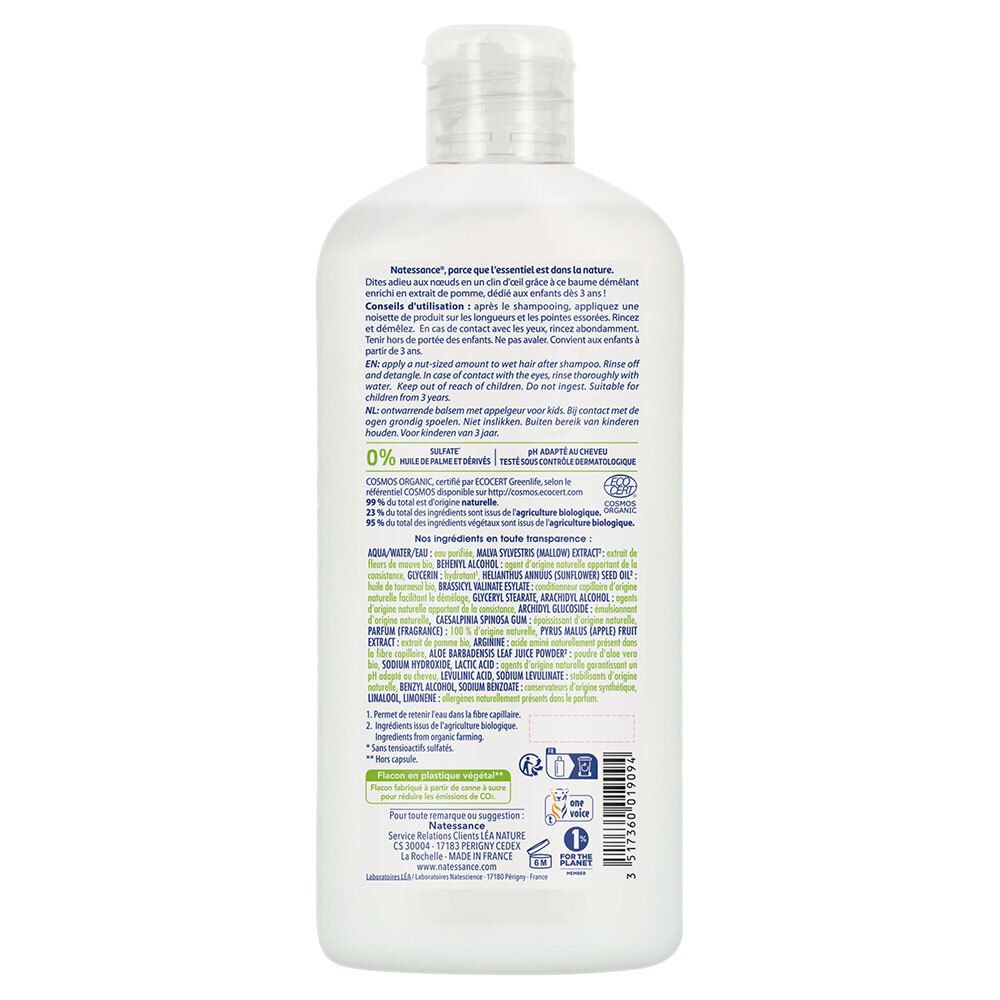 Dos d'un flacon blanc. Texte multilingue. Ingrédients et instructions. Contient des certifications.