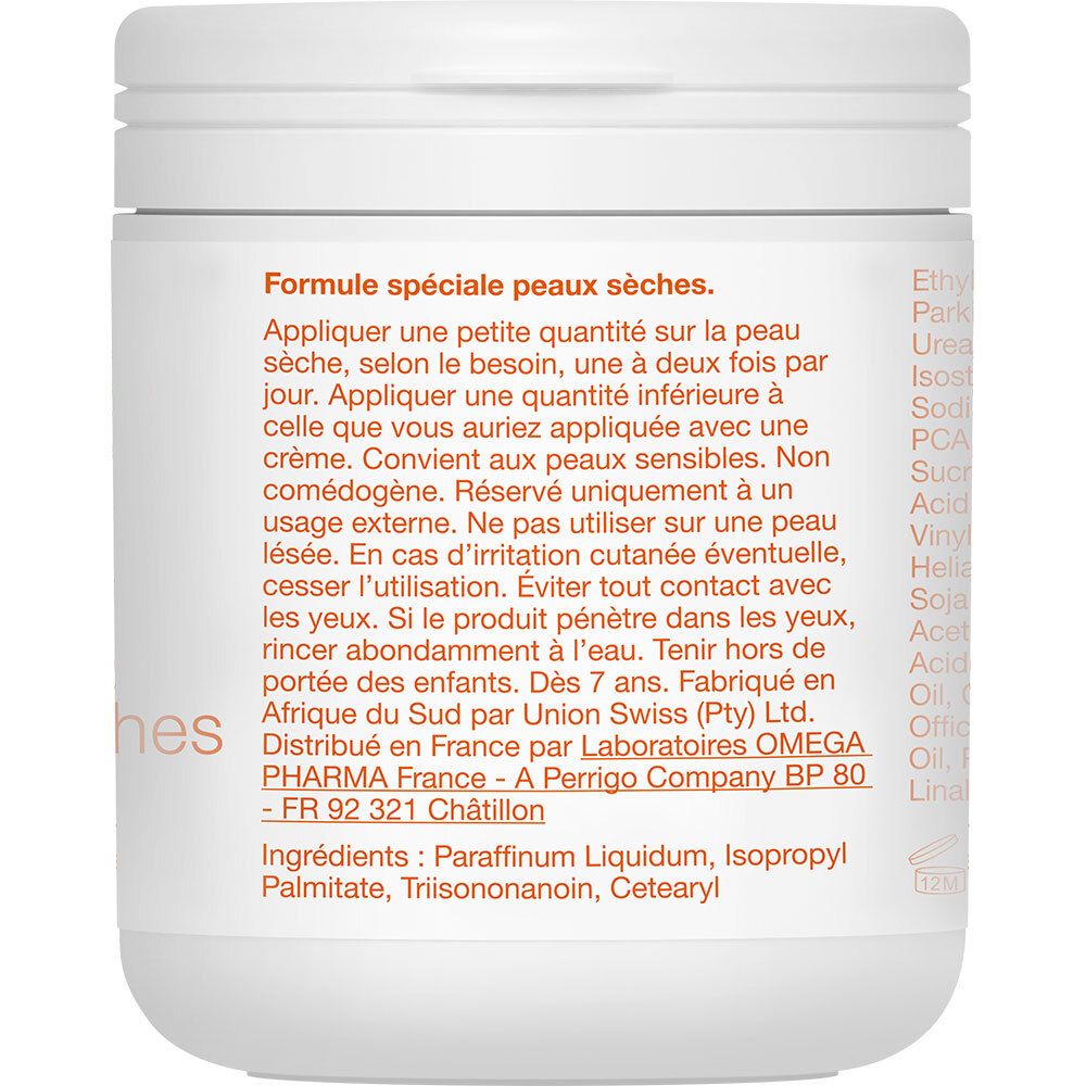 Dos du pot blanc avec texte orange. Ingrédients et mode d'emploi.