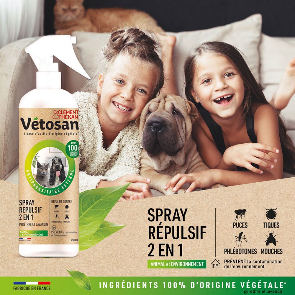 Deux filles, un chien et un flacon de spray. Inscription: Clément Thékan Vétosan. Spray Répulsif 2 en 1.