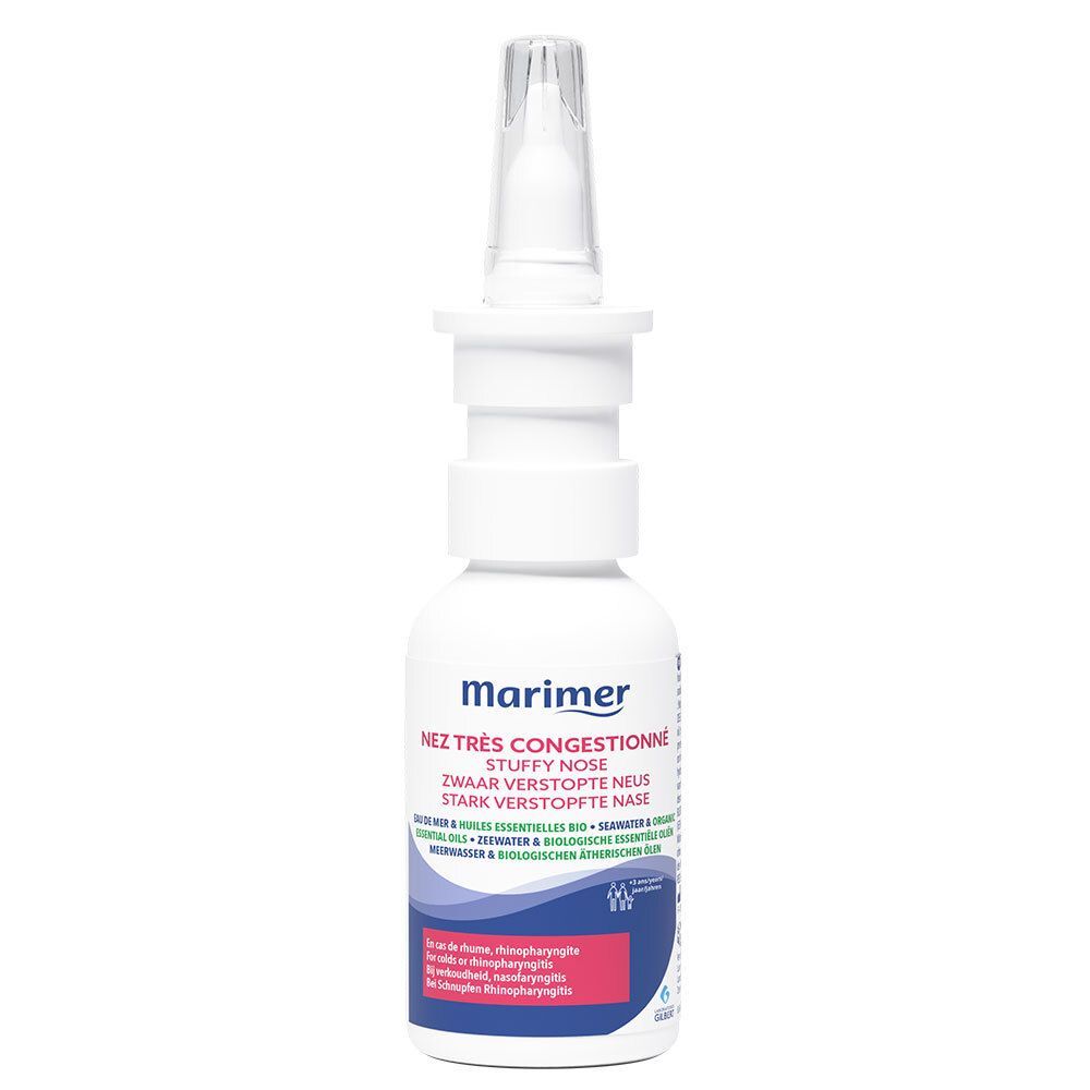 Flacon de spray nasal Marimer. Inscription : Nez très congestionné, pour le nez bouché. Contient de l'eau de mer et des huiles essentielles. Flacon blanc.