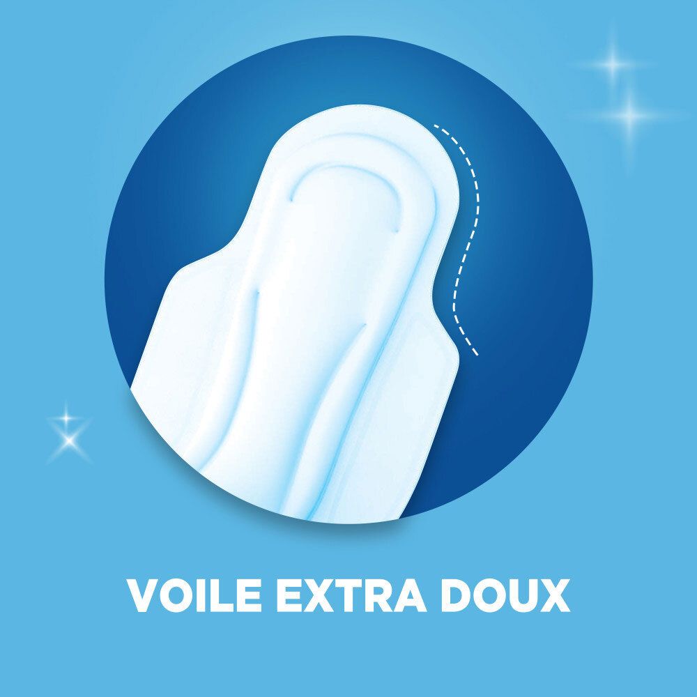Gros plan sur une serviette hygiénique Vania, montrant la surface douce (Voile Extra Doux).