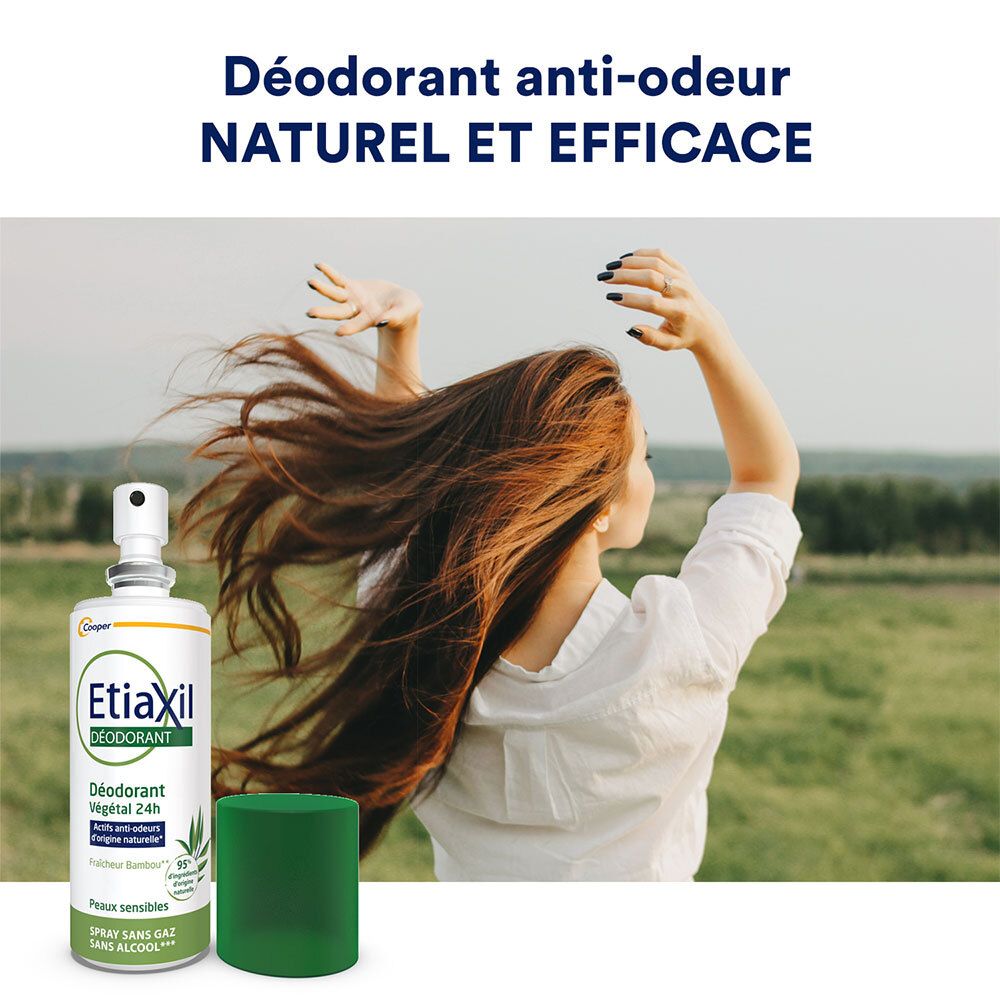 Etiaxil Déodorant Spray et bouchon vert. Femme à l'extérieur. Texte: Déodorant anti-odeur naturel et efficace.