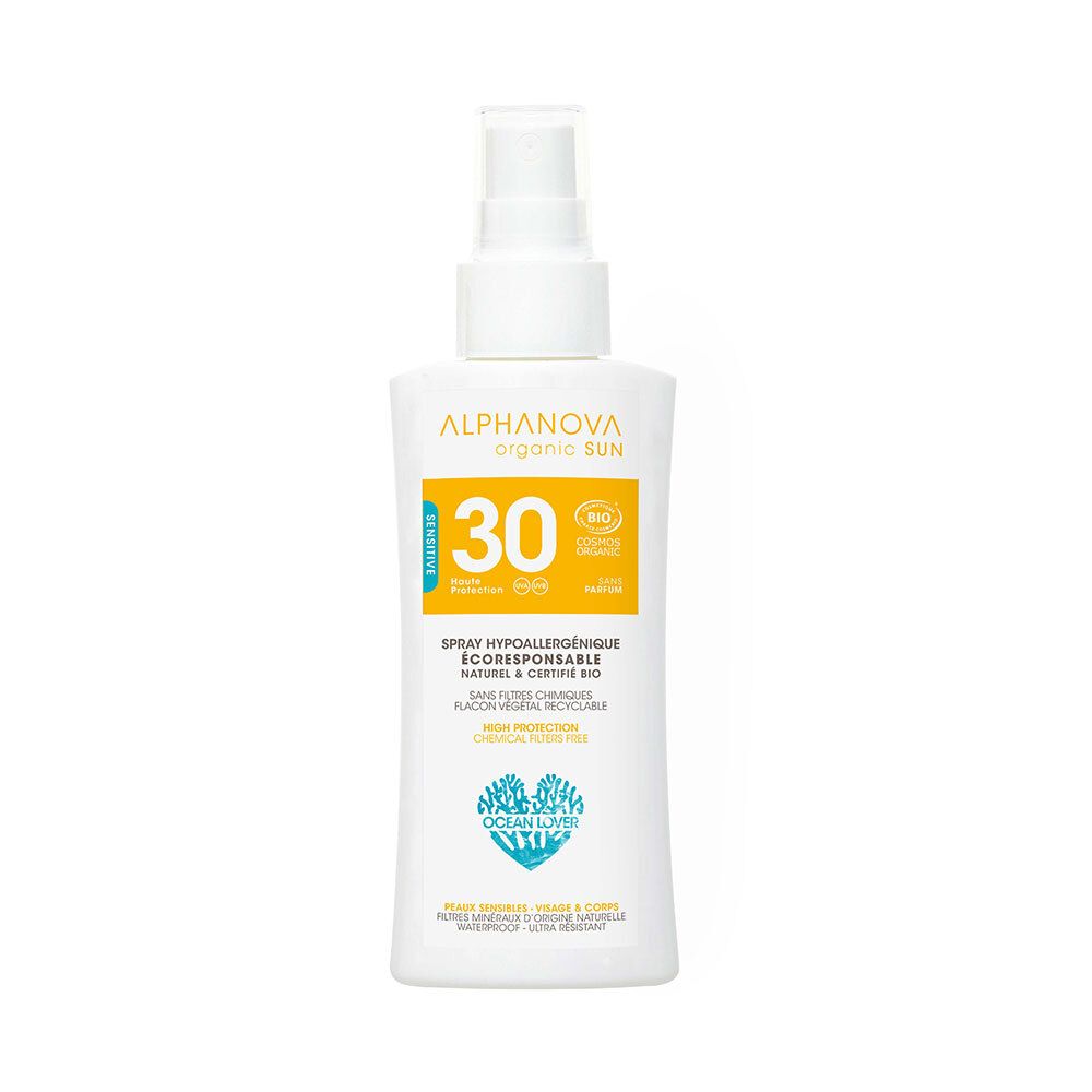 Spray solaire blanc avec vaporisateur. Étiquette jaune avec SPF 30 et certification bio. Texte : Spray hypoallergénique, écoresponsable.