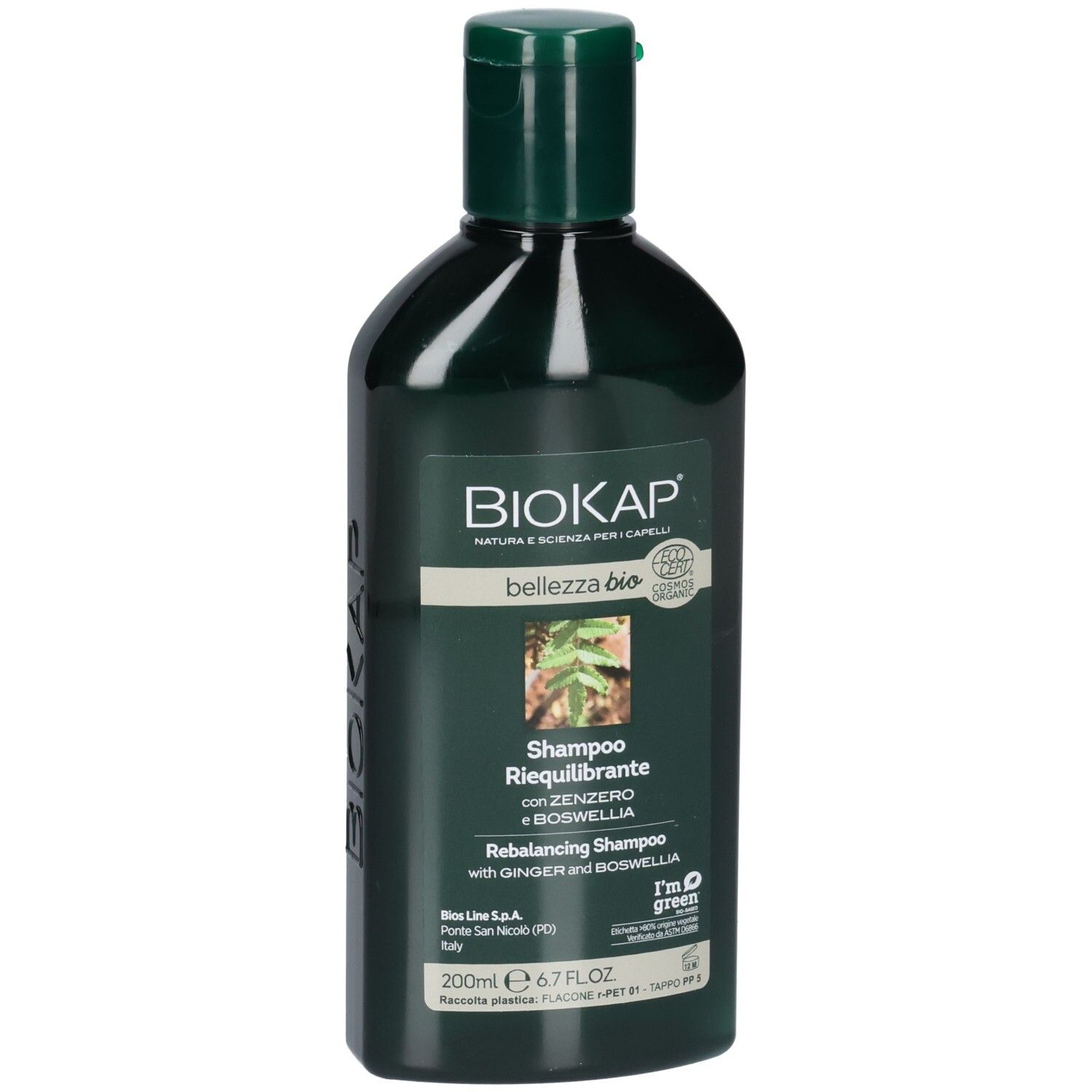 Flacon vert de shampooing BIOKAP. Inscription: bellezza bio, Shampoo Riequilibrante, avec gingembre et boswellia. Bouchon vert.