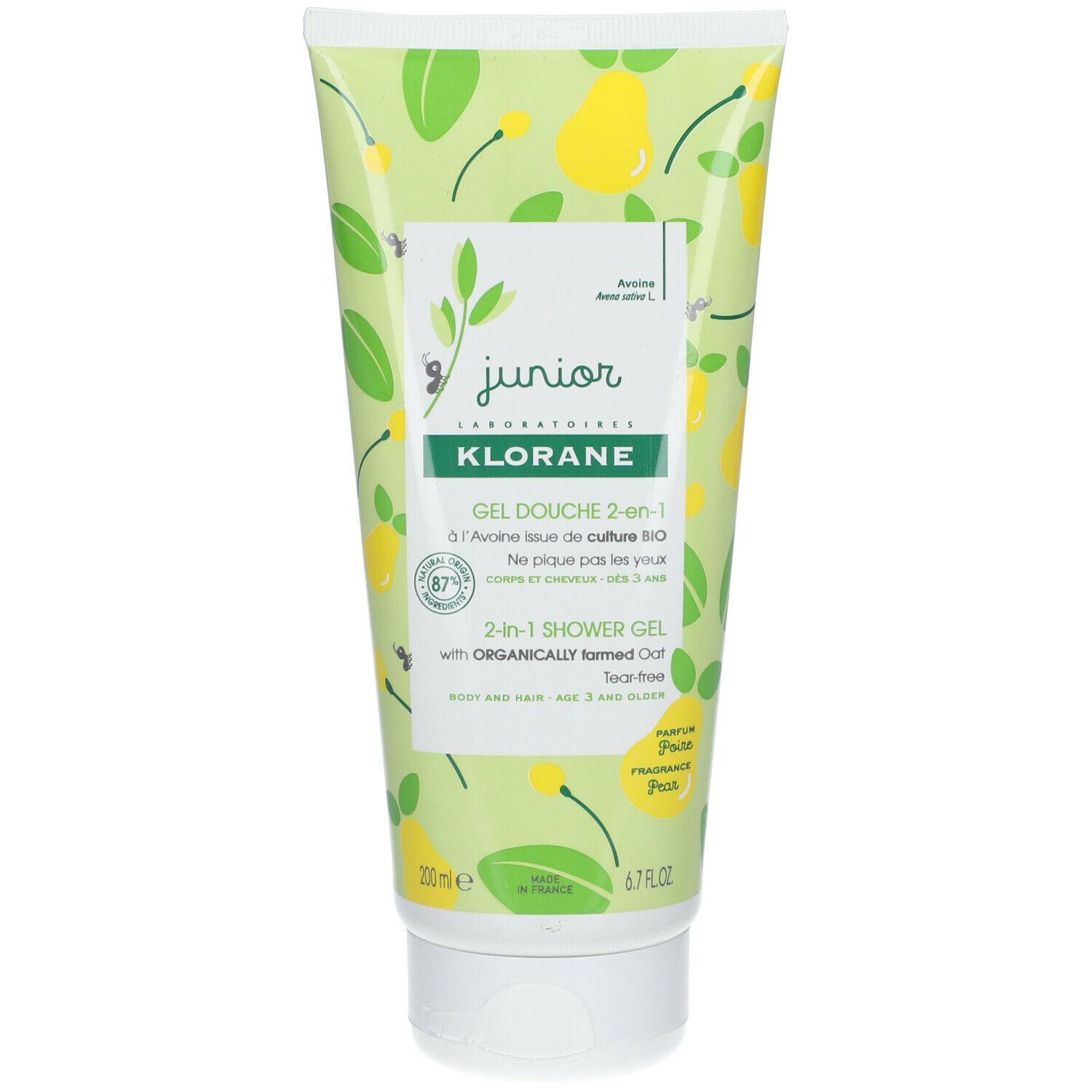 Tube vert avec motifs poires et feuilles jaunes. Inscription : Klorane Junior Gel douche 2 en 1. Contient 87% d'ingrédients d'origine naturelle.