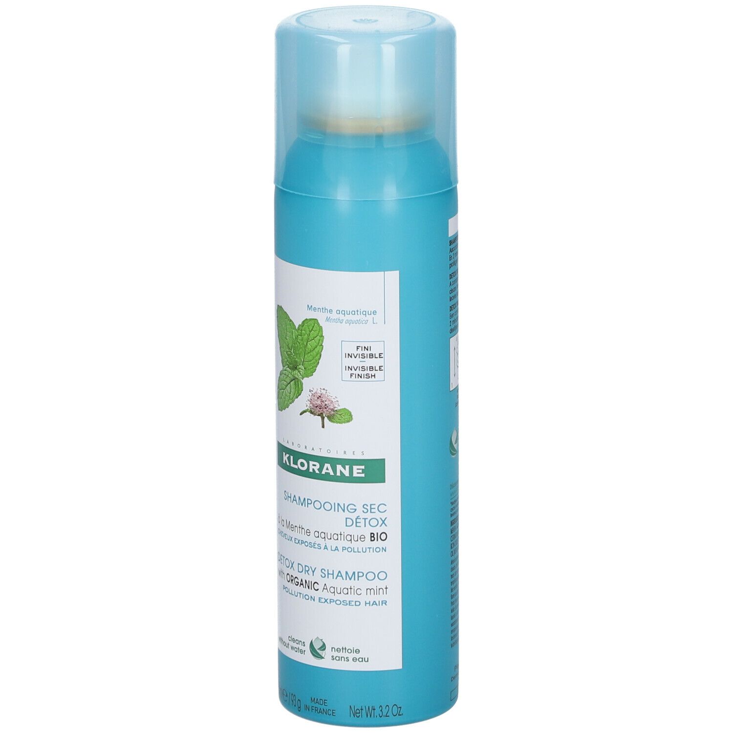Flacon spray turquoise avec informations produit et illustration de menthe. Shampooing sec.