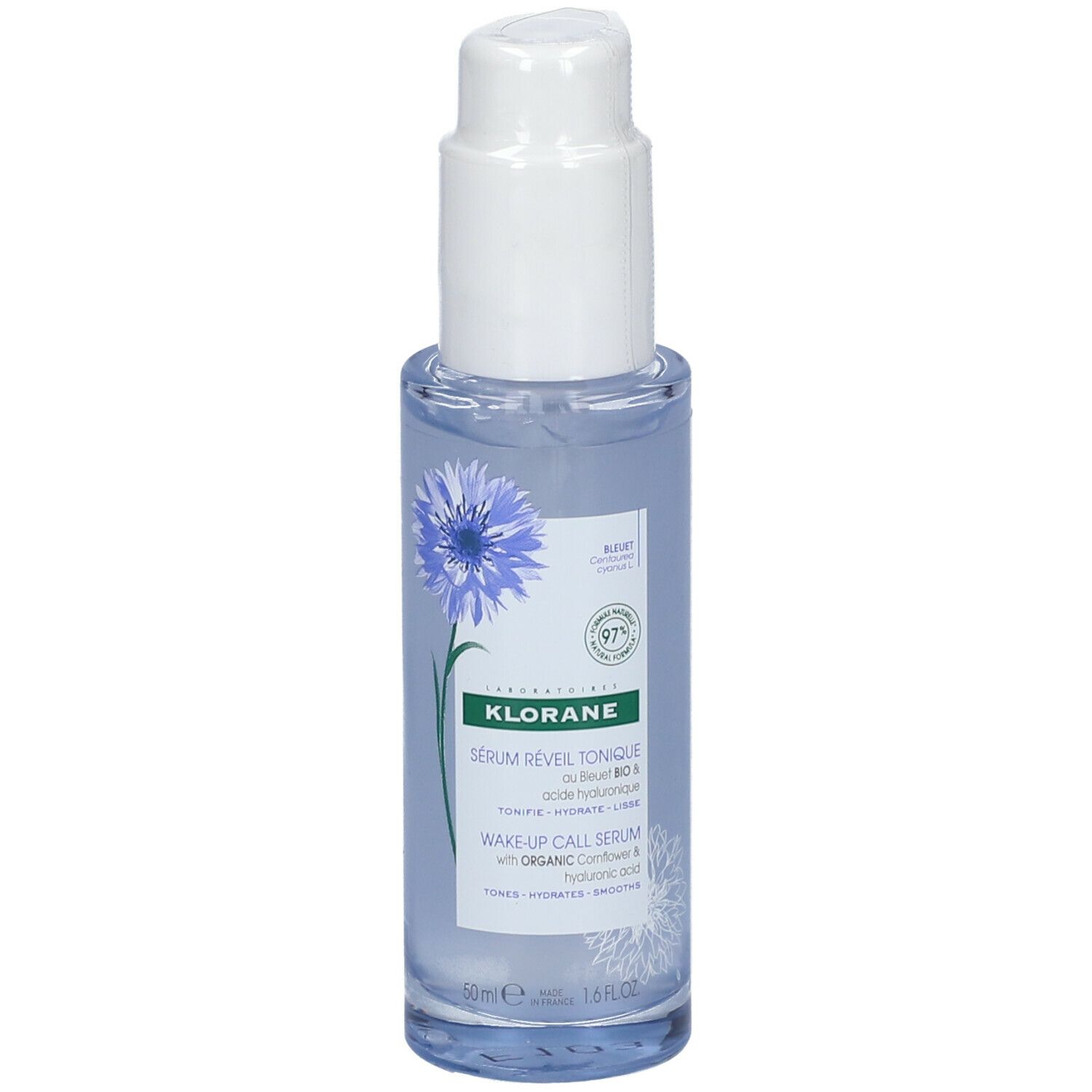 Flacon bleu transparent avec pompe blanche. Inscription: KLORANE, Sérum Réveil Tonique, Wake-up Call Serum. Illustration de bleuet.