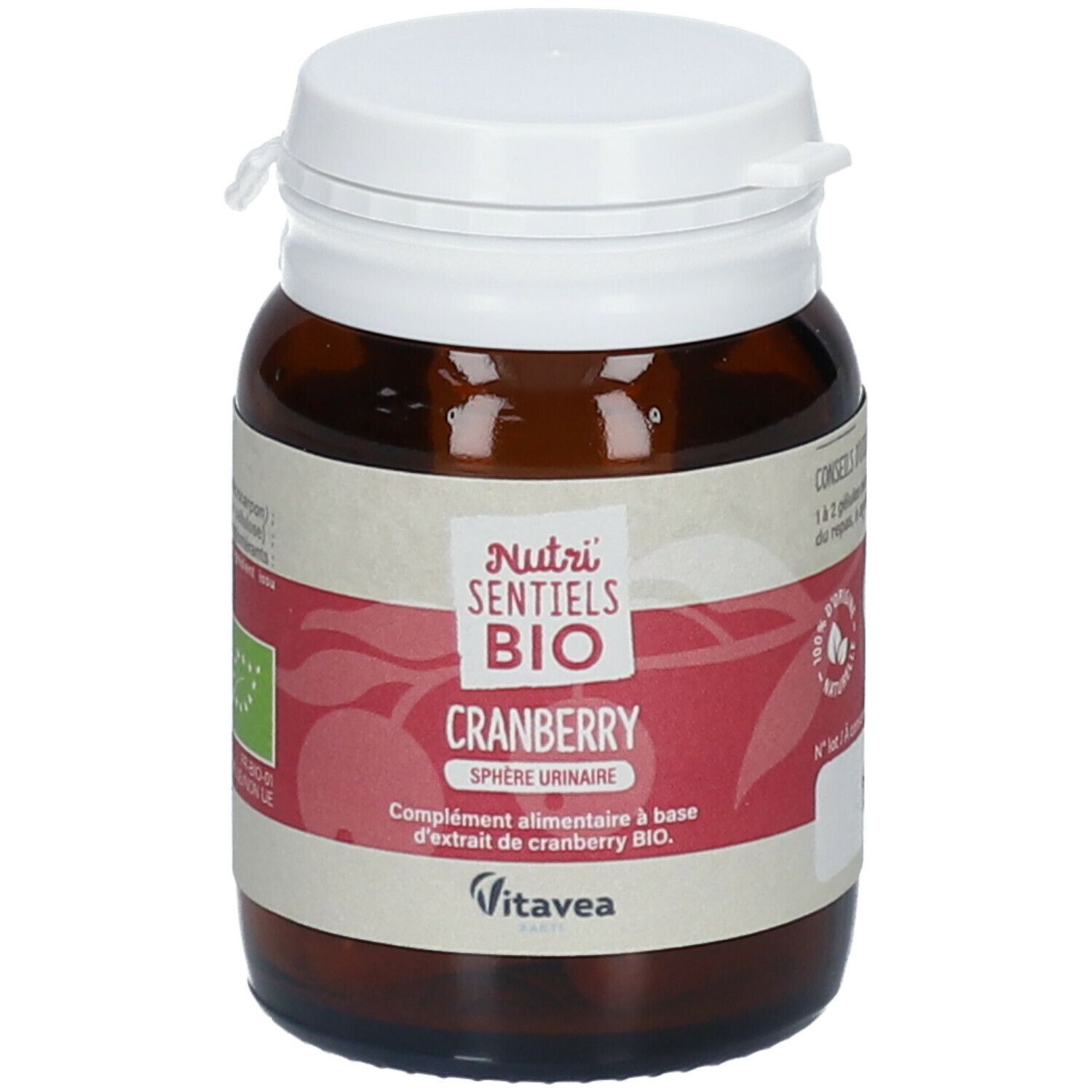 Flacon en verre brun avec couvercle blanc. Étiquette avec nom du produit et label bio. Complément alimentaire à la cranberry.