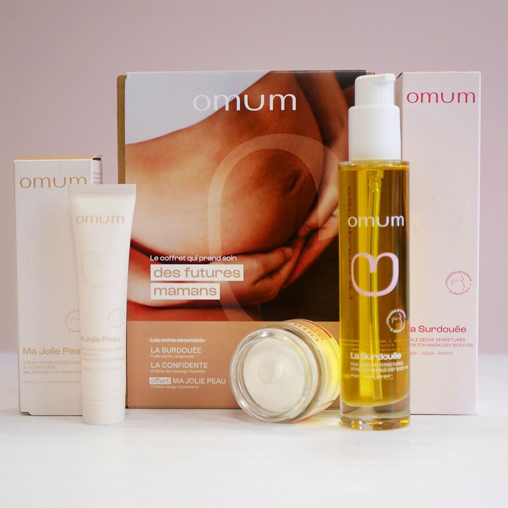 Coffret OMUM pour futures mamans : huile corps, crème visage et crème corps, présentés de face.