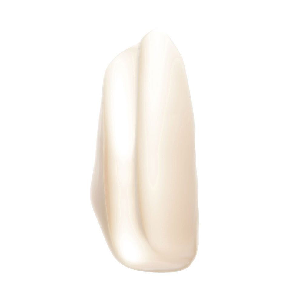 Texture de crème. Couleur blanc-beige. Sur fond blanc.
