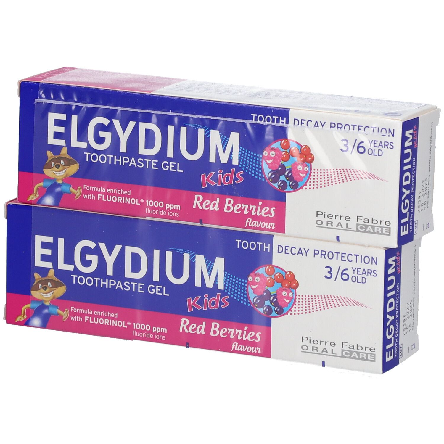 Deux boîtes de dentifrice. Emballage bleu et rose. Texte: ELGYDIUM Kids, Red Berries, 3/6 ans.