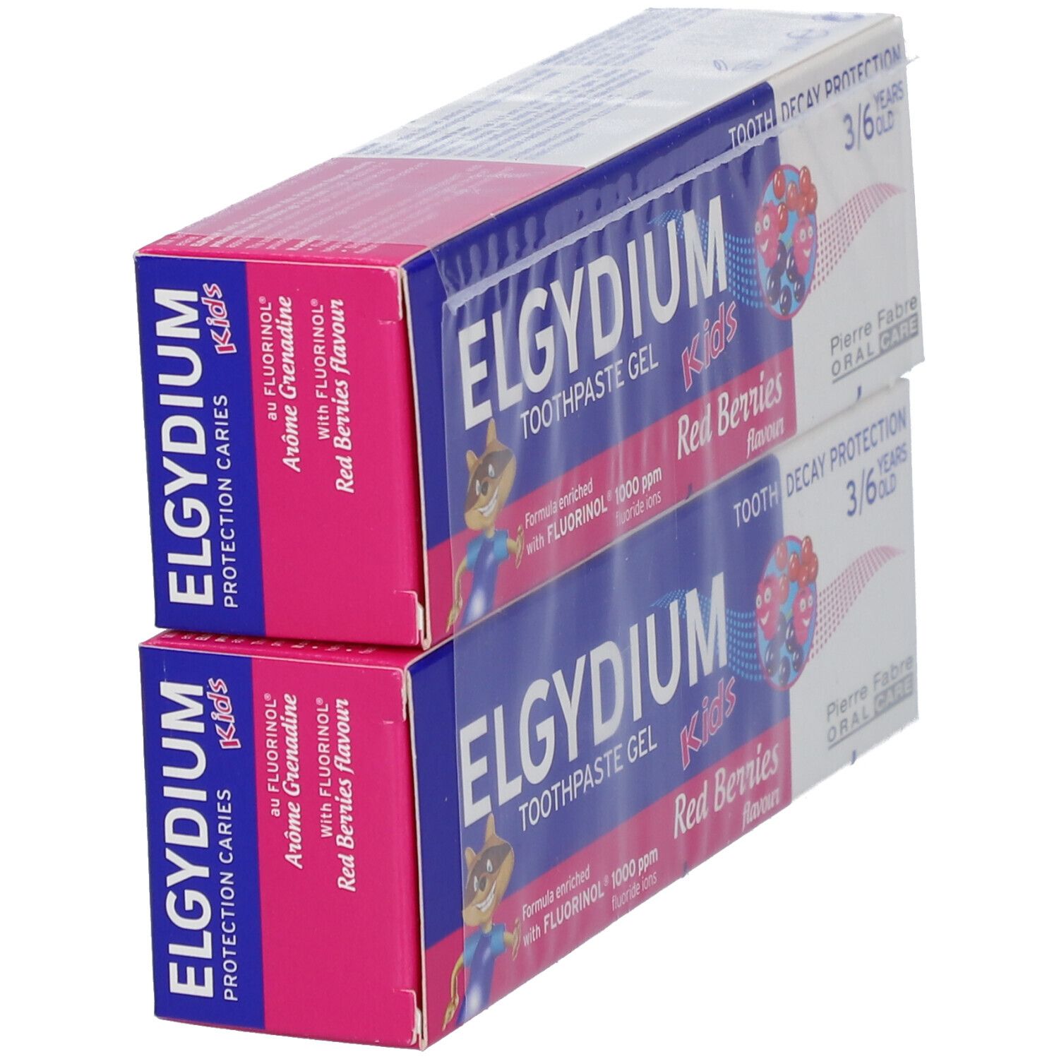 Deux boîtes de dentifrice. Emballage rose et bleu. Texte: ELGYDIUM Kids, Red Berries, 3/6 ans.
