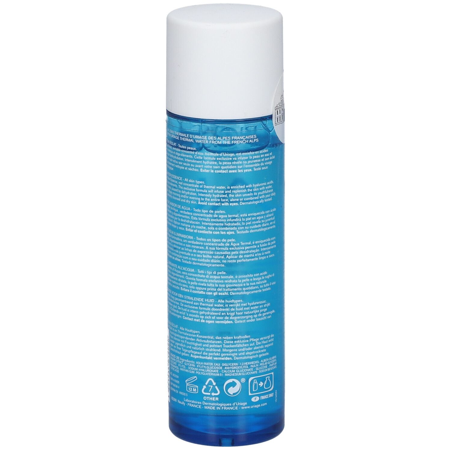 Dos d'un flacon bleu avec bouchon blanc. Texte multilingue. Contient 100ml.