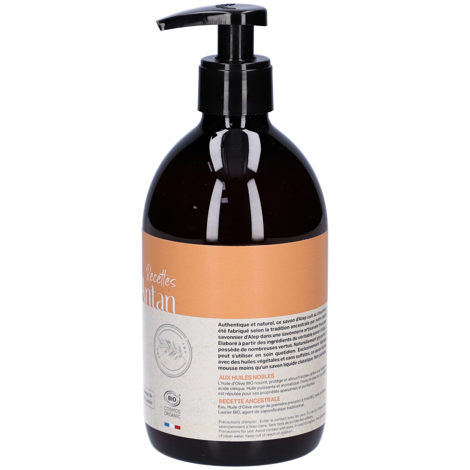 Dos du flacon brun avec pompe noire. Étiquette avec texte et certification bio. Contient des huiles.