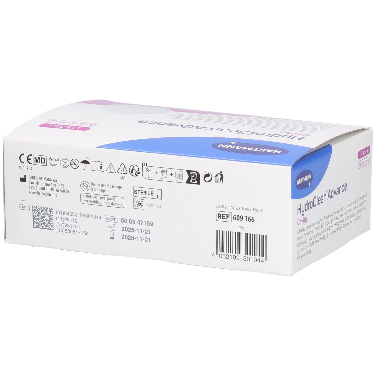 Dos de la boîte HydroClean Advance Cavity. Informations, certifications et code-barres. Blanc avec accents bleus et roses.