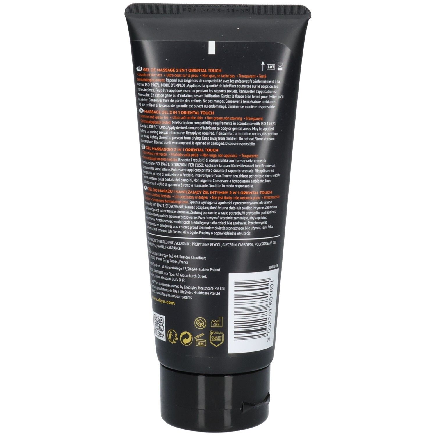 Dos d'un tube noir. Texte en plusieurs langues. Code-barres et symboles. Fermeture noire.