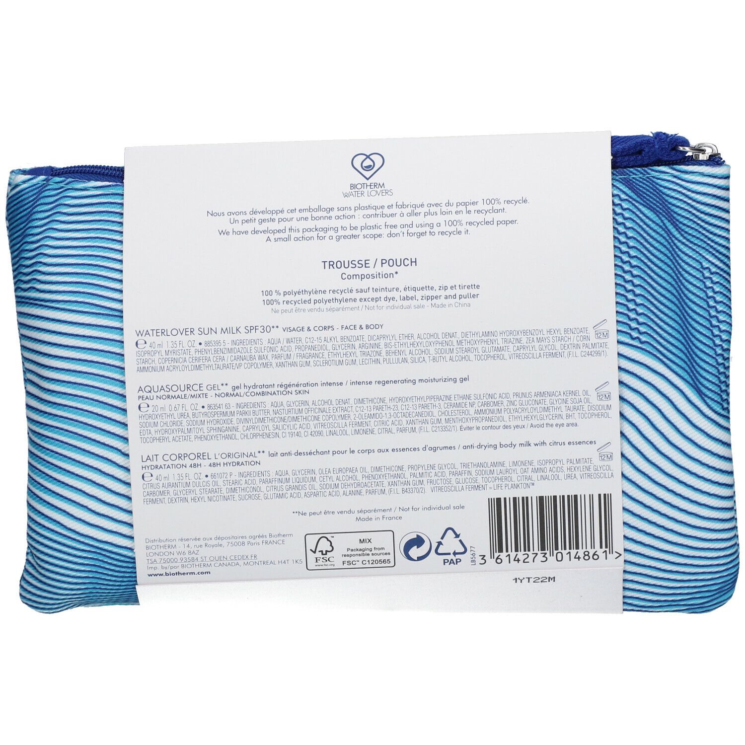 Trousse de toilette bleue et blanche à rayures avec fermeture éclair. Informations produit et logos au dos.