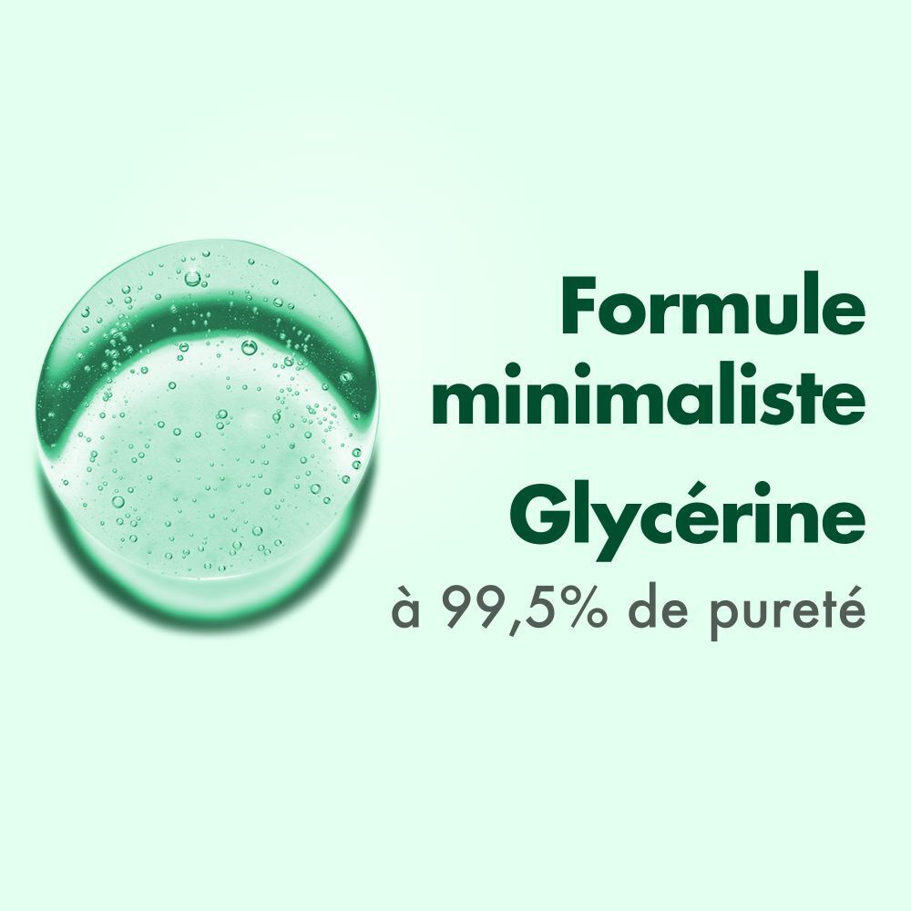 Gros plan d'un liquide vert. Texte: Formule minimaliste Glycérine à 99,5% de pureté.