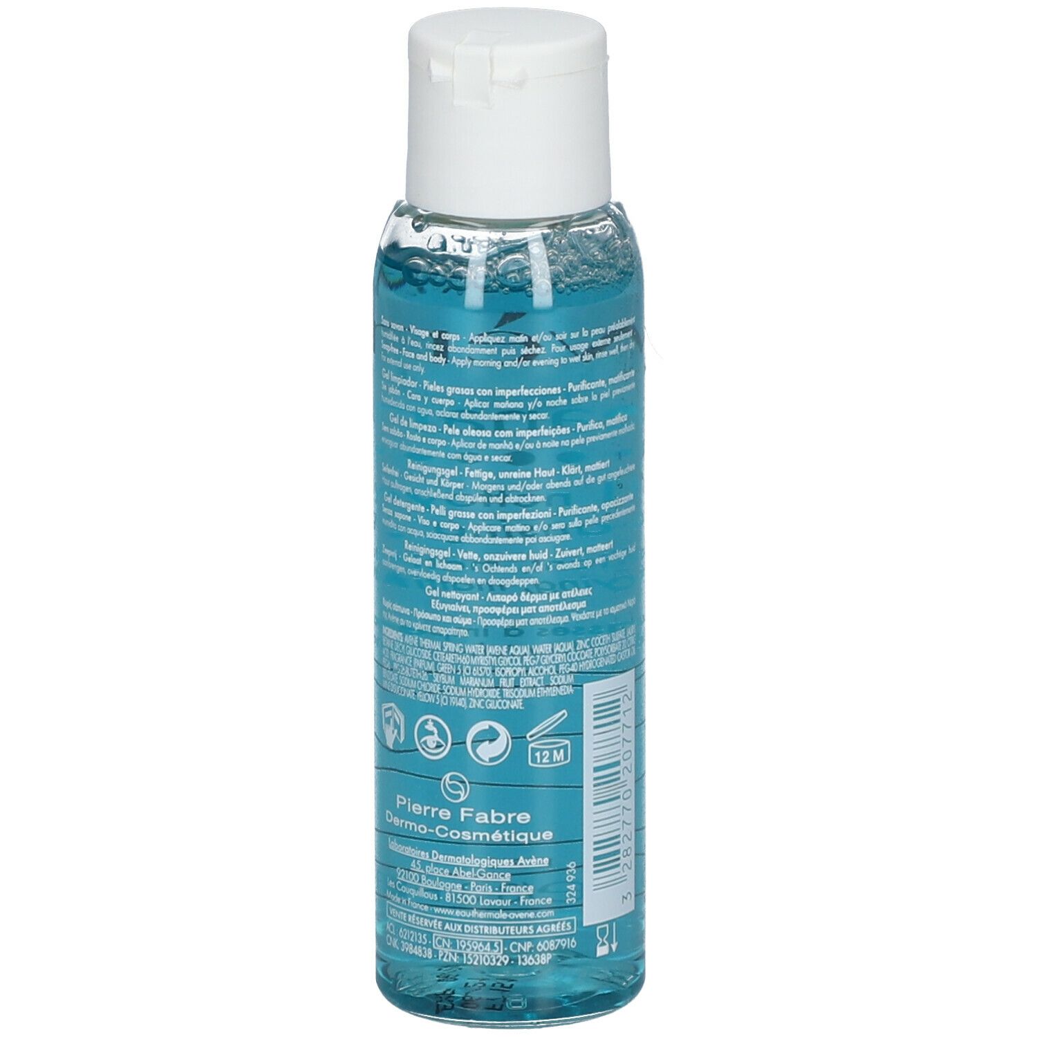 Dos d'un flacon bleu transparent. Texte multilingue. Informations fabricant et symboles.