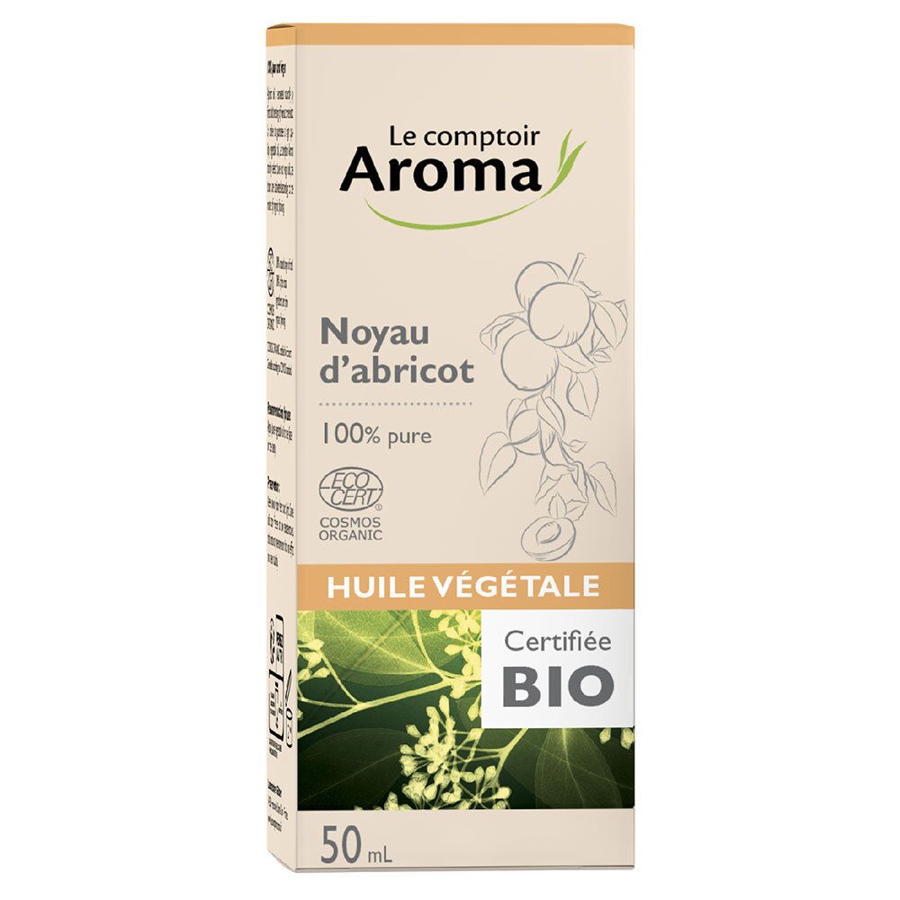 Emballage carton avec inscriptions: Le Comptoir Aroma, Noyau d'abricot, 100% pure, Huile végétale, Certifié BIO. Logo EcoCert.