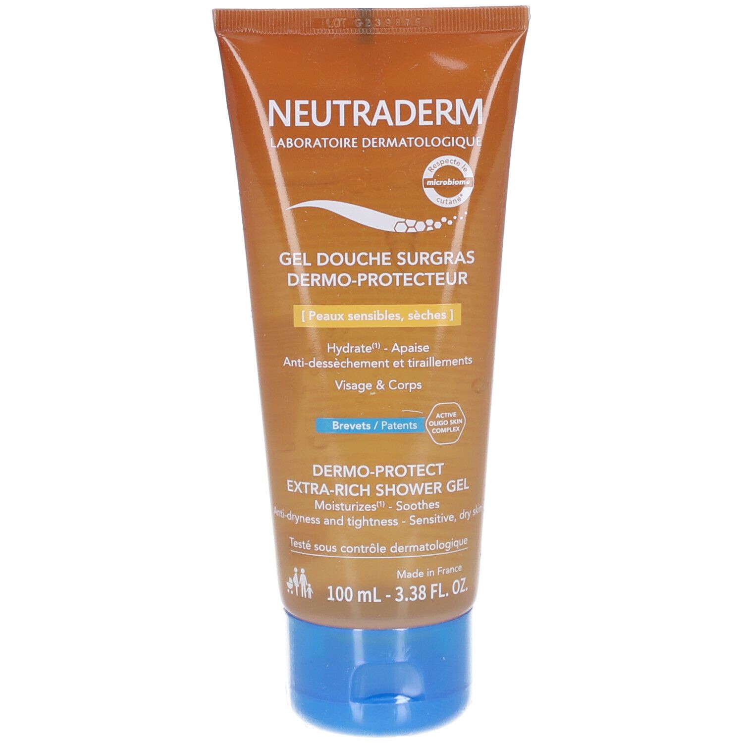 Tube beige à bouchon bleu. Inscription: NEUTRADERM, GEL DOUCHE SURGRAS DERMO-PROTECTEUR. Pour peaux sensibles, sèches.