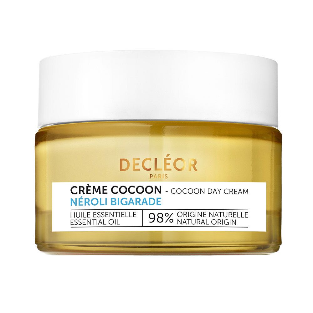 Pot de crème avec couvercle blanc. Inscription: Decléor, Crème Cocoon, Néroli Bigarade. 98% d'origine naturelle.