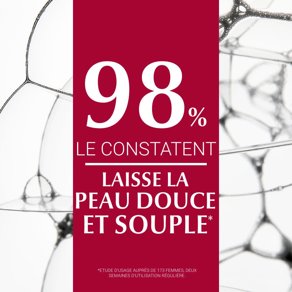 Texte: 98% constatent que la peau est douce et souple. Fond: bulles de savon.