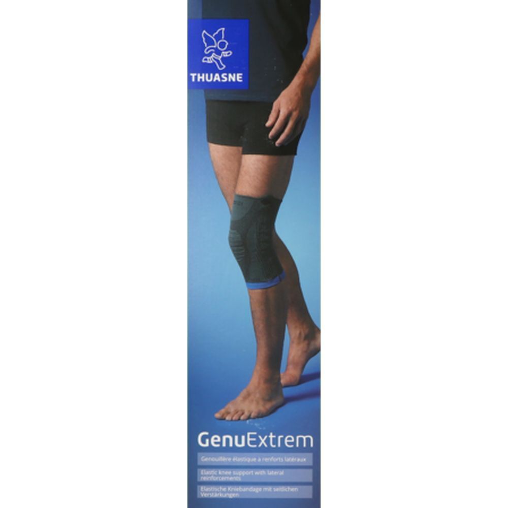 Genouillère THUASNE GenuExtrem, noire et bleue, sur la jambe d'un homme. Emballage avec nom et logo du produit.