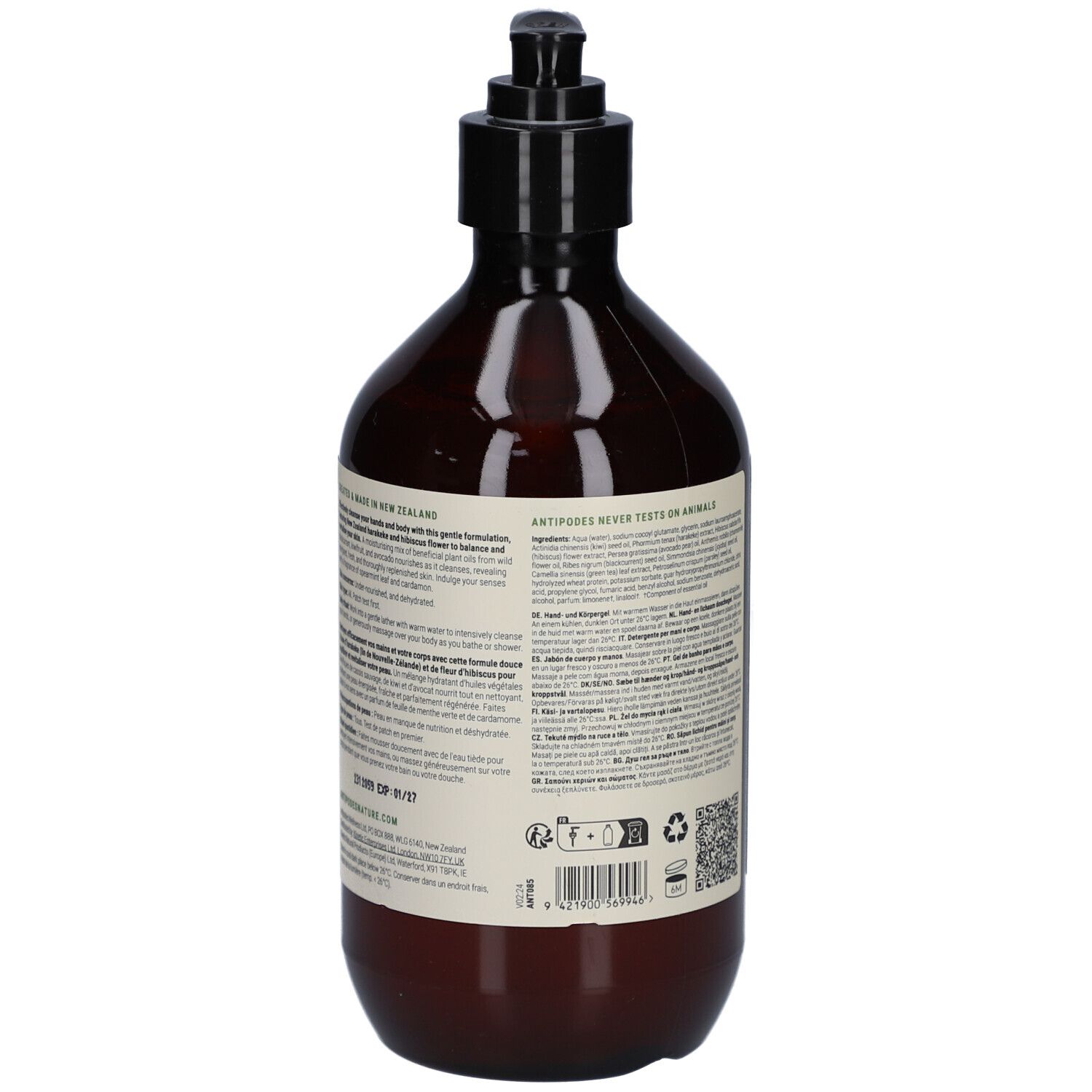 Dos du flacon brun avec pompe noire. Texte sur l'étiquette. Code QR et logos.